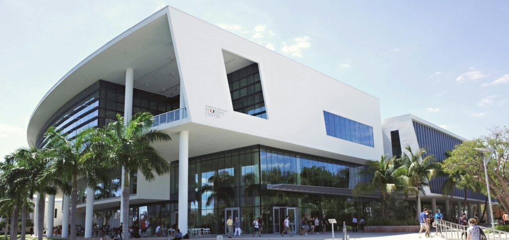 Contemporary architecture at the University of Miami campus with vibrant student life and lush surroundings.