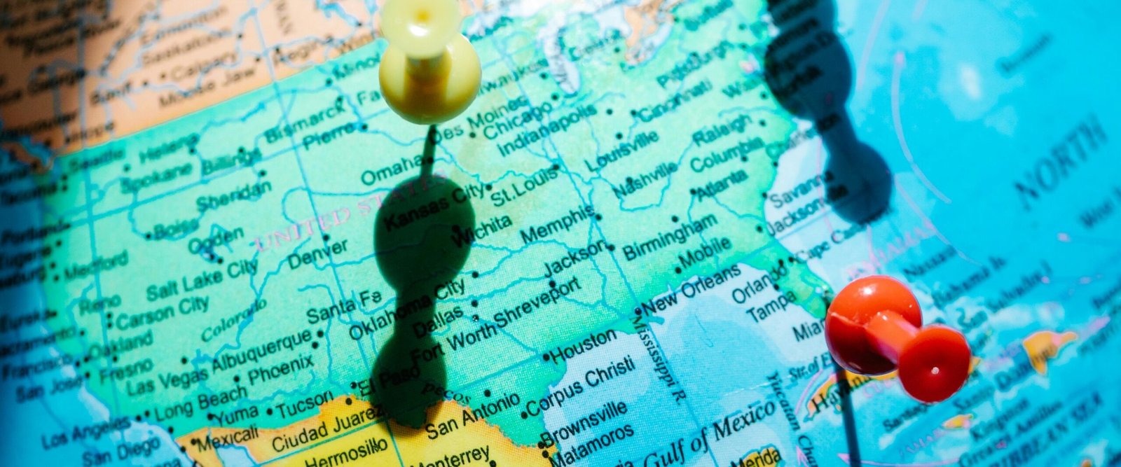 Detailed map of North America featuring pushpins highlighting regions in Mexico and the US.